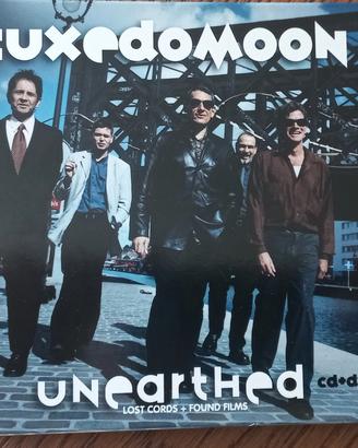 Per collezionisti cd+dvd Tuxedo Moon "Unearthed"
