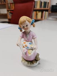 statuina "bambina coi fiori"