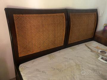 struttura letto in ferro battuto, legno e vimini