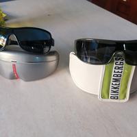 2 paia di occhiali da sole Prada e Bikkembergs 