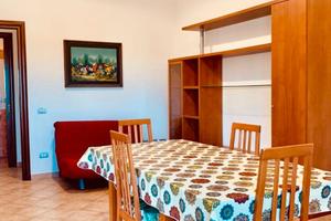 Appartamento Luminoso con Balconi e Posto Auto