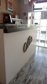 Arredamento negozio caffe’