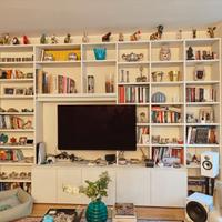 Libreria a parete con spazio TV