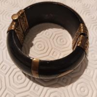bracciale rotondo rigido osso e metallo