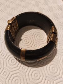 bracciale rotondo rigido osso e metallo