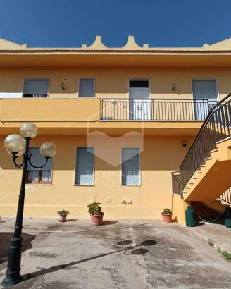 Porzione di villa con giardino privato