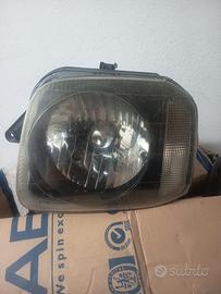 faro anteriore sx Suzuki Jimny 