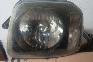 faro anteriore sx Suzuki Jimny 