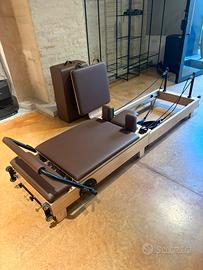 Reformer Pilates in legno pieghevole con accessori