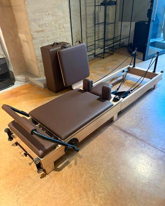 Reformer Pilates in legno pieghevole con accessori