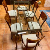 Tavolo in cristallo e ferro battuto