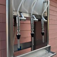 Riempitrice inox 3 becchelli con pompa