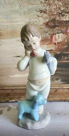 Figurina in porcellana NAO Lladro, bimbo, realizza