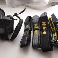tracolle e tappi fotocamera e obbiettivo Nikon