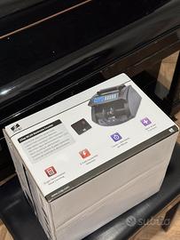 Contabanconote e verificatore di banconote false