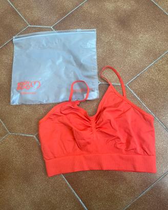 Top modellante rosso