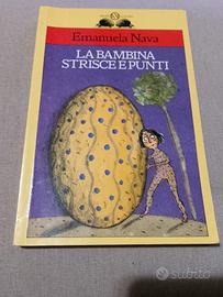 La bambina strisce e punti.