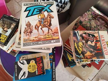 libri e fumetti in blocco 