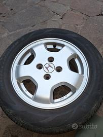 Cerchi in lega 14" con pneumatici estivi 185/60R14