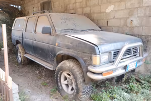 Nissan king Cab pick-up.