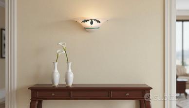 Applique in vetro scavo