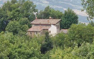 Casa con giardino