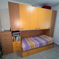 Letto a ponte con scrivania