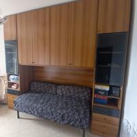 Armadio ponte con divano letto