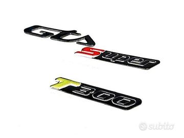 VESPA GTS 300 TARGHETTA LATERALE T 300 SCRITTA COF