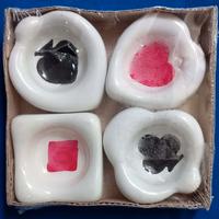 posacenere con i semi delle carte