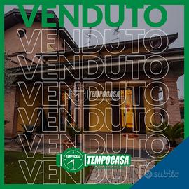 Villa a schiera con giardino