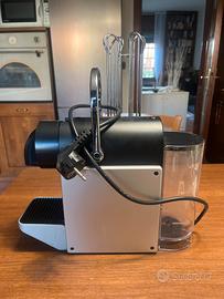 DeLonghi macchina del caffe e porta capaule