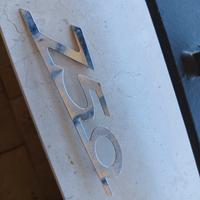 Fiat 750 Vignale fregio posteriore originale 