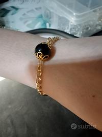 braccialetto SU COCCU con perla di ossidiana nera