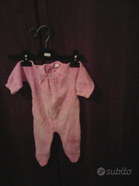 Tutina di colore rosa di ciniglia per neonata