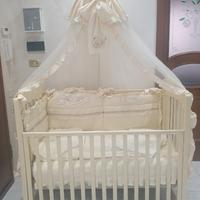 Culla unisex  con baldacchino e completo  letto.