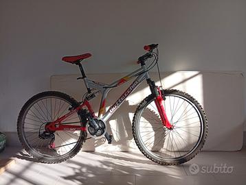 Bicicletta ragazzo/adulto con ammortizzatoro ruote