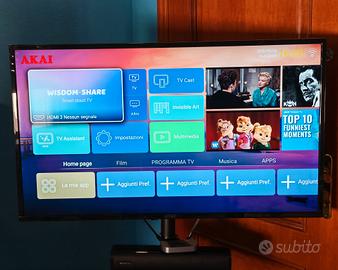 TV Akai 43" + soundbar + subw + stand con ruote 