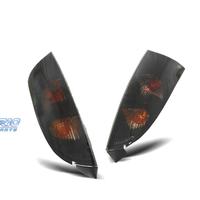 FANALI PER FORD FOCUS MK1 98-04 SFONDO NERO AFFUMI