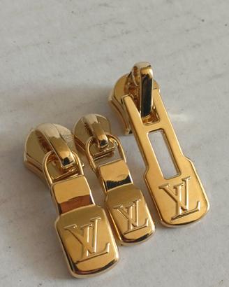 Set tirazip in metallo  dorato Louis Vuitton 
