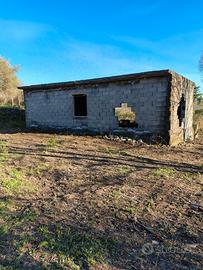 Terreno con immobile in sanatoria