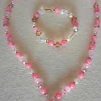 Collana di cristalli e pietre rosa con bracciale