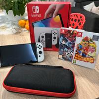 Nintendo switch oled + giochi e acessori