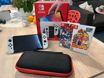 Nintendo switch oled + giochi e acessori