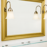 Specchio bagno con cornice dorata e applique integ