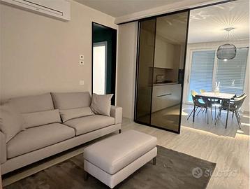 APPARTAMENTO NUOVO con CORTE E GARAGE