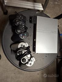 PlayStation 2 Slim argentata + 2 controller + memo