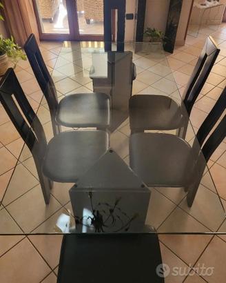 Tavolo in cristallo con piedi in marmo + sedie