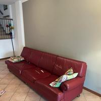 Divano artigianale in pelle rosso