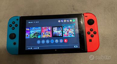 Nintendo swithc con giochi e accessori